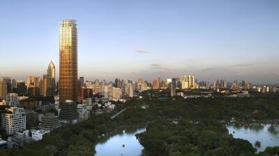 Panoramic view of a modern city skyline at dusk