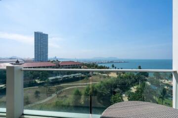 Stunning balcony view overlooking the sea and park