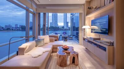 Spacious living room with modern furniture and city view