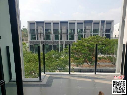 View from the balcony showcasing exterior of modern residential buildings