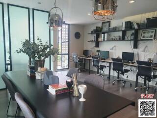 Modern office workspace with stylish decor and ample lighting