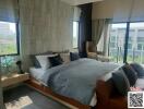 Elegant modern bedroom with large windows
