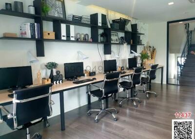 Spacious home office with modern design and multiple workstations