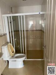 Modern bathroom interior with shower and toilet