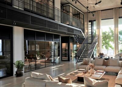 Spacious modern living room with high ceilings and large windows