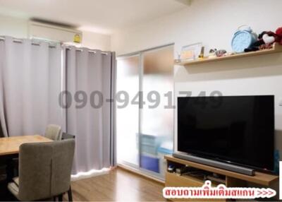 Cozy and well-furnished living room with modern amenities