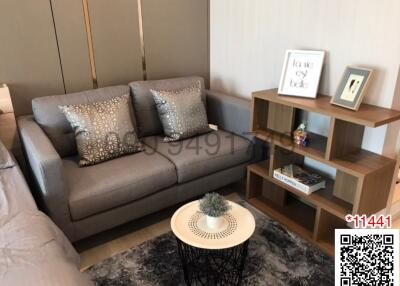 Cozy modern living room with comfortable sofa and stylish decor