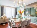 Elegant living room with dining area, modern light fixtures, and large windows