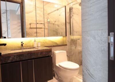 Modern bathroom with marble finish and elegant fixtures