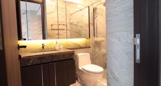 Modern bathroom with marble finish and elegant fixtures