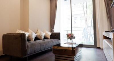 Modern living room with natural light and elegant decor