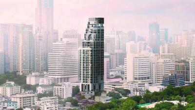 High-rise modern building amidst city skyline