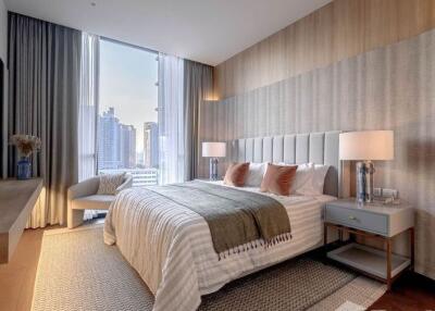 Modern bedroom with panoramic city view through large windows