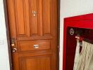 Wooden apartment door with number 14B