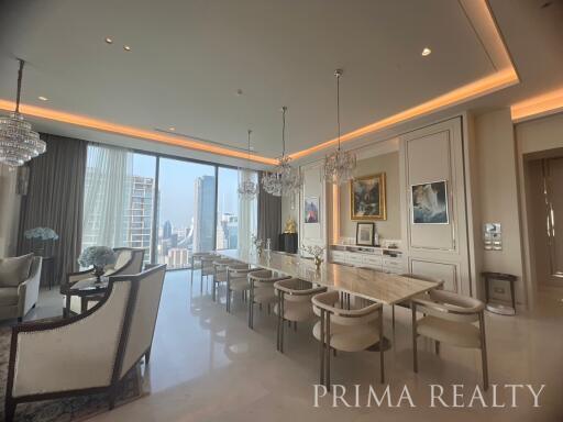 Luxurious living room with modern dining area and city view