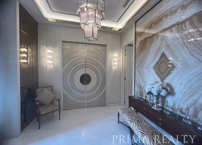 Luxurious lobby entrance with marble walls and designer furnishings