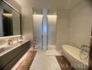 Elegant modern bathroom with a freestanding bathtub and double vanity