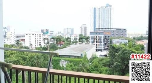 Spacious balcony with an urban view