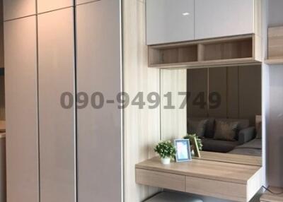 Modern bedroom with built-in wardrobe and study nook