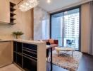 Modern kitchen with dining area and balcony access in a high-rise apartment