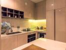 Modern kitchen with elegant cabinetry and integrated appliances