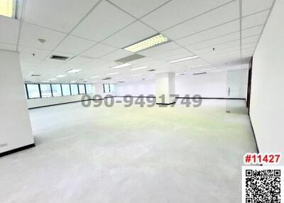 Spacious commercial open space with large windows
