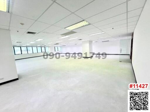 Spacious commercial open space with large windows