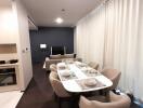 Modern dining area with adjoining living space in a contemporary apartment