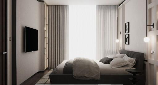 Modern bedroom with natural light and stylish furnishings