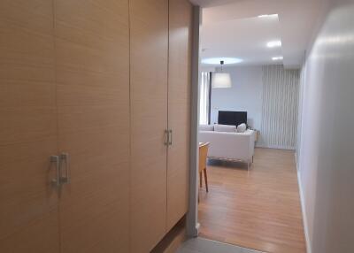 Spacious bedroom entrance leading to a modern living room