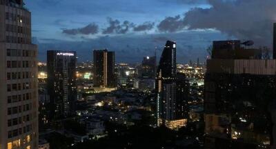 Cityscape view from high-rise building at dusk