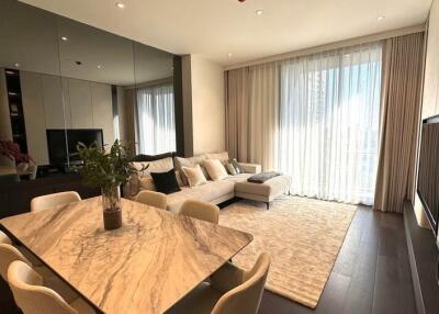 Spacious and modern living room with dining area