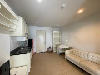 Spacious living room with integrated kitchen area