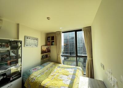 Bright and spacious bedroom with large window