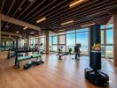 Modern gym interior with ocean view in luxury residential building
