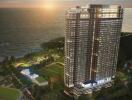 Luxurious high-rise residential building at dusk with ocean view