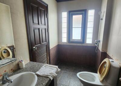 Spacious bathroom with natural light