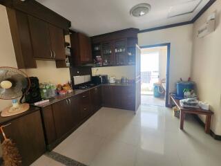 Spacious kitchen with modern appliances and ample cabinetry