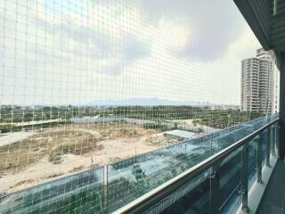 Spacious balcony overlooking urban landscape