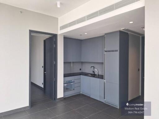 Modern apartment kitchen with integrated appliances