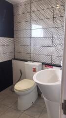 Contemporary bathroom with patterned tiles