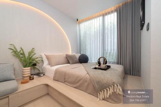 Modern bedroom with stylish decor and ambient lighting