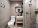 modern bathroom interior with a walk-in shower, mirrored vanity and stylish decor