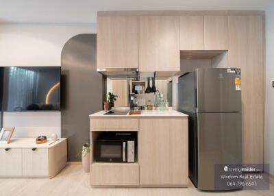 Modern kitchen with wooden cabinets and state-of-the-art appliances