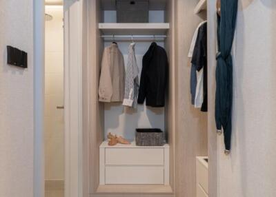 Modern built-in wardrobe in a neatly organized residential space