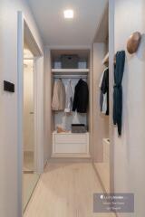 Modern built-in wardrobe in a neatly organized residential space