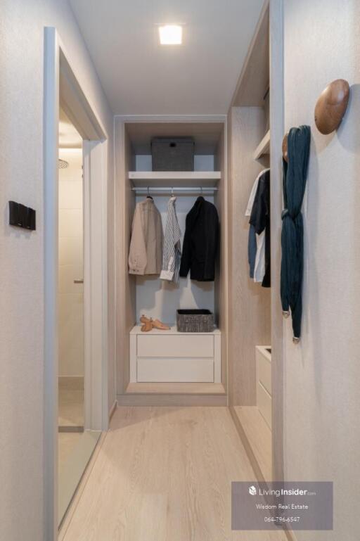 Modern built-in wardrobe in a neatly organized residential space