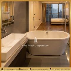 Luxurious bathroom with freestanding tub and bedroom view