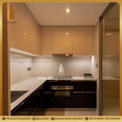 Modern kitchen with elegant lighting and sleek appliances