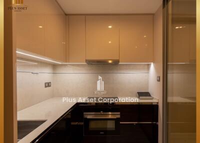 Modern kitchen with elegant lighting and sleek appliances